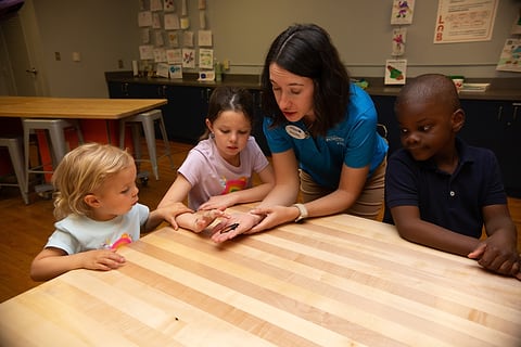 Educator leading an activity with children