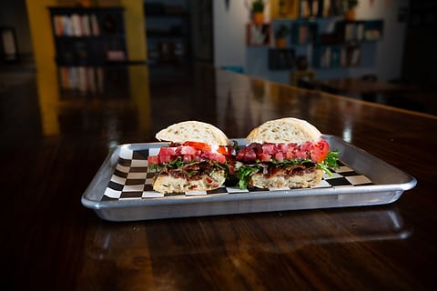 Restaurant sandwich on a checkered tray