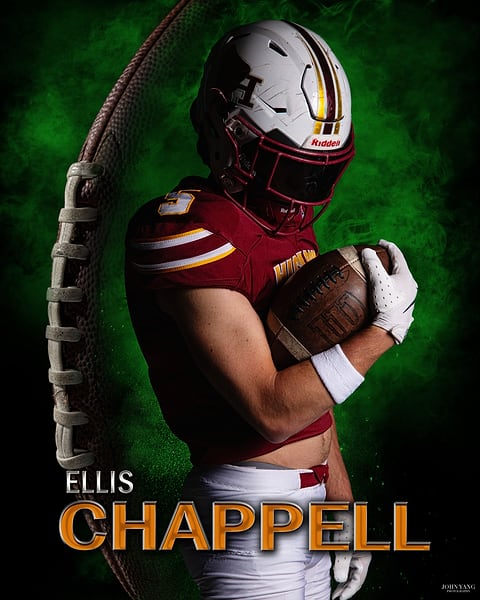 Football player portrait with dramatic green smoke